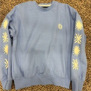 Light Blue Crewneck Sweatshirt with Sun Design